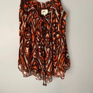 Gorgeous sleeveless top. Smoke free home.